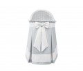 Mobile wicker bed with grey skirt and ecru bow