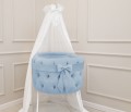 Upholstered cradle with ecru bow- velvet blue  