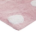 Pink rug with large white dots