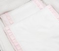 Baby bedding with pink flounces