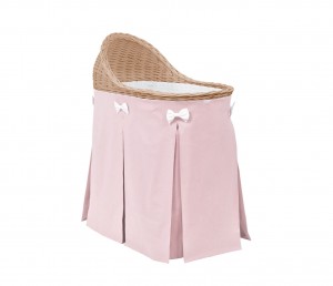 Mobile wicker bed with pink skirt - natural wicker