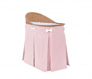 Mobile wicker bed with pink skirt - natural wicker