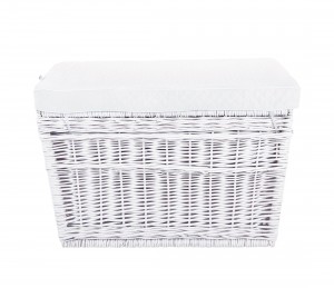 White wicker trunk with white pillow
