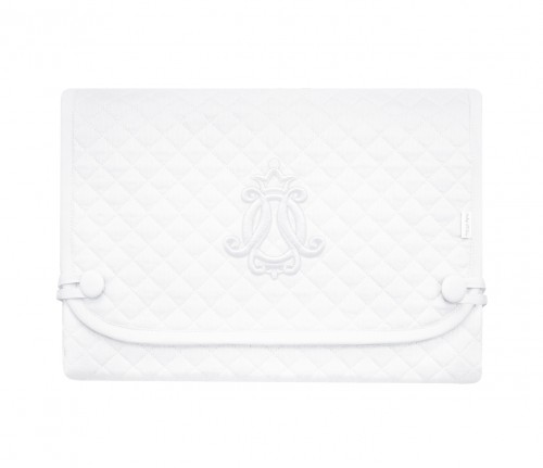 White changing mat with emblem